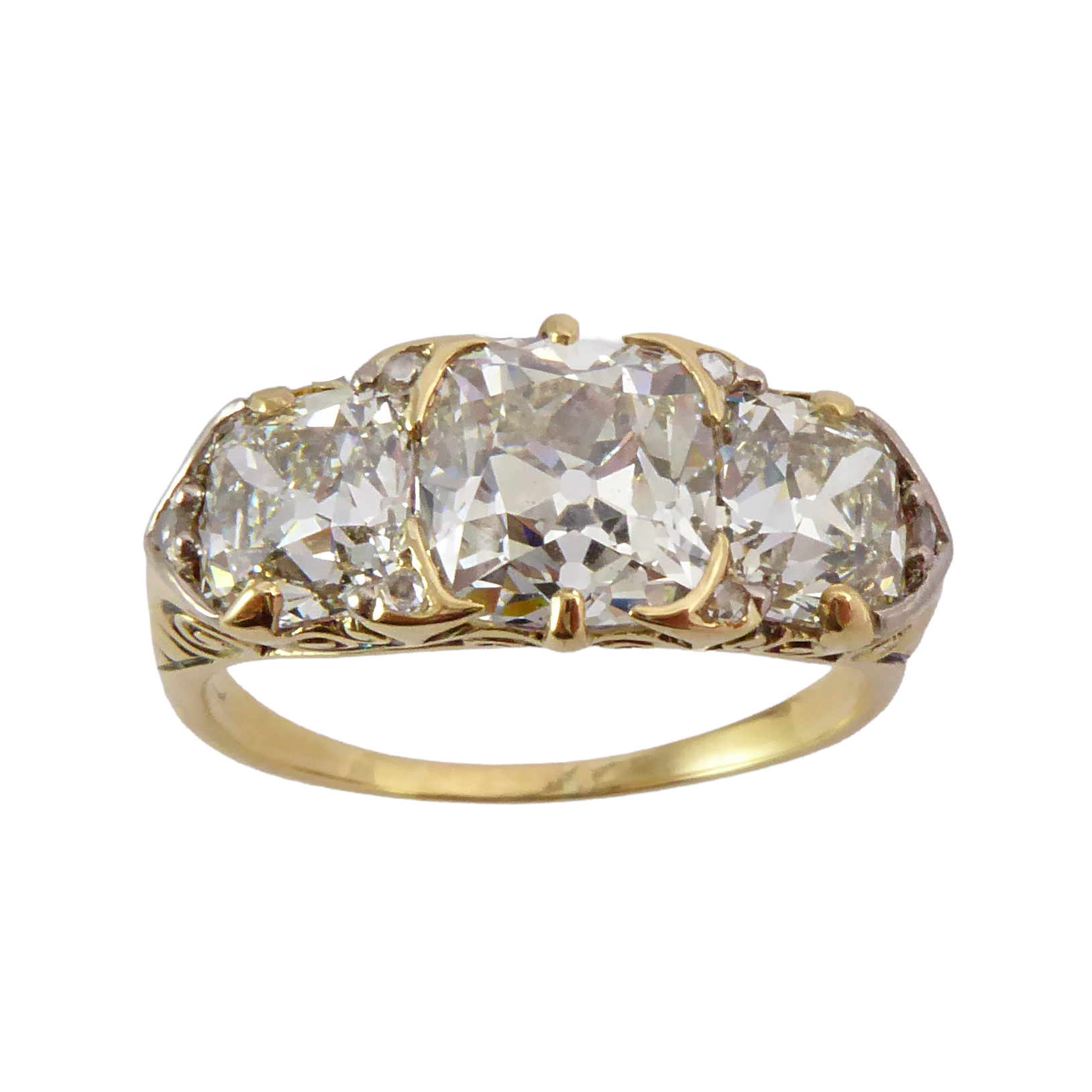 Late 19th / early 20th century graduated three stone square cushion cut diamond ring, c.1900, the central diamond of approximately 2.30ct,